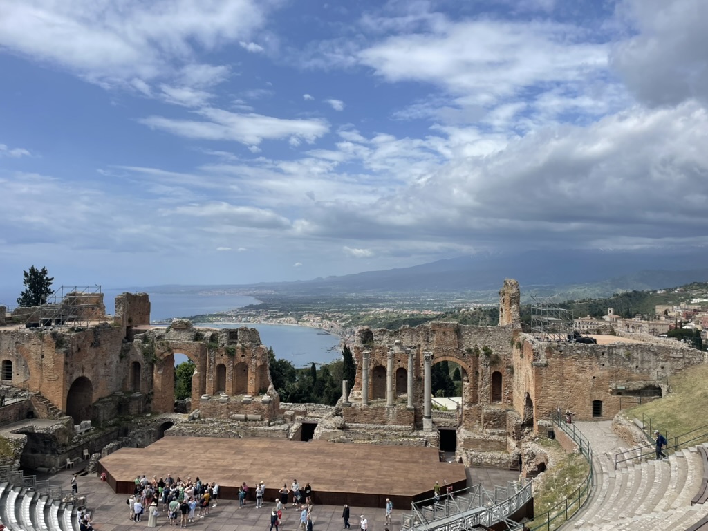 Ancient theater and coastline from Arjun's travels